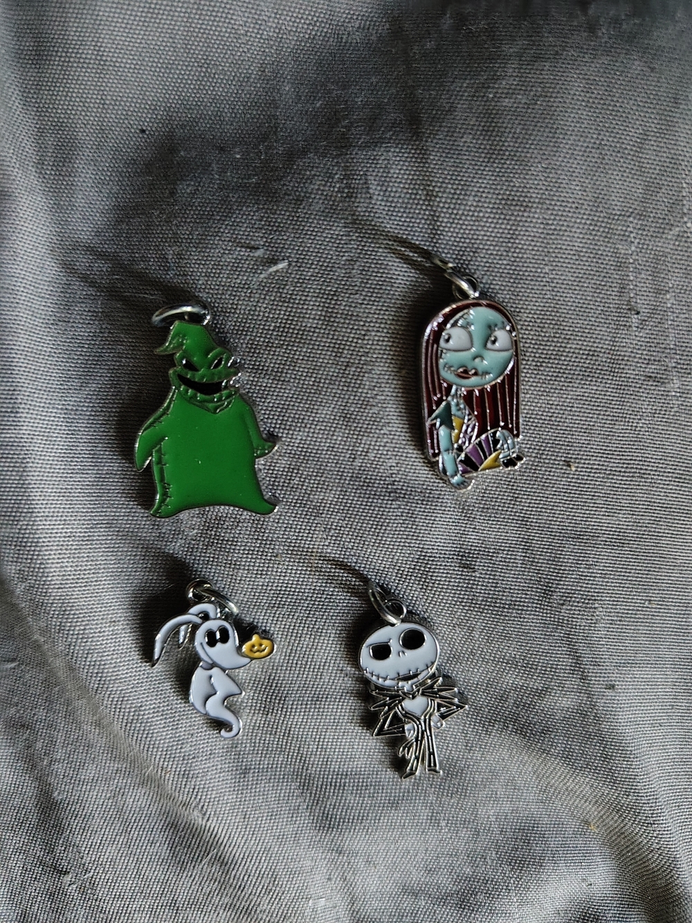 The Nightmare Before Christmas Enamel Charm Set - Oogie, Sally, Jack & Zero